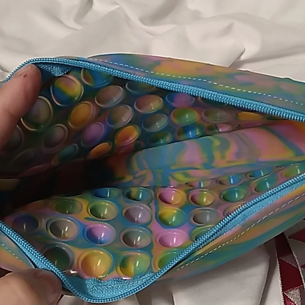 7.5 x 3.5 x 1 3/8 inches Rainbow Pop It Bag